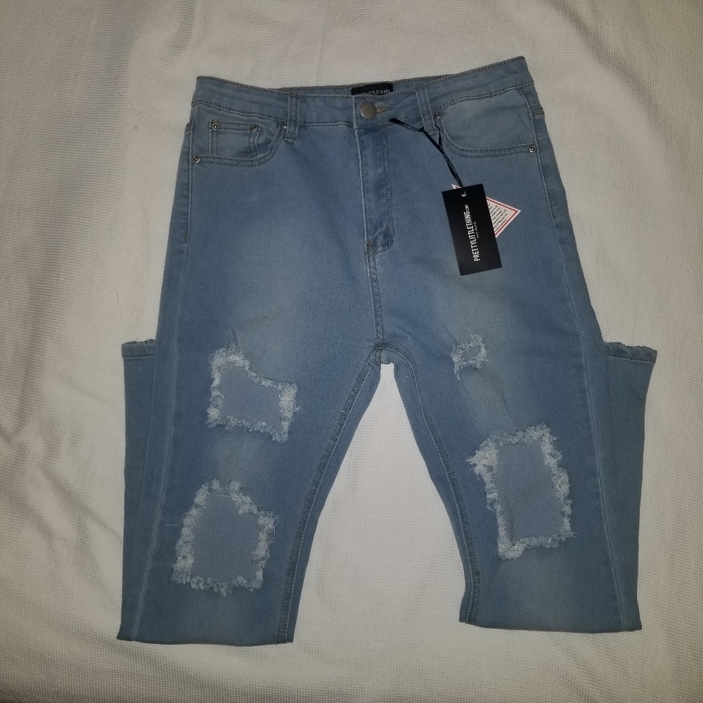 NWT PrettyLittletThing Extreme Rip Jeans.   BB2
